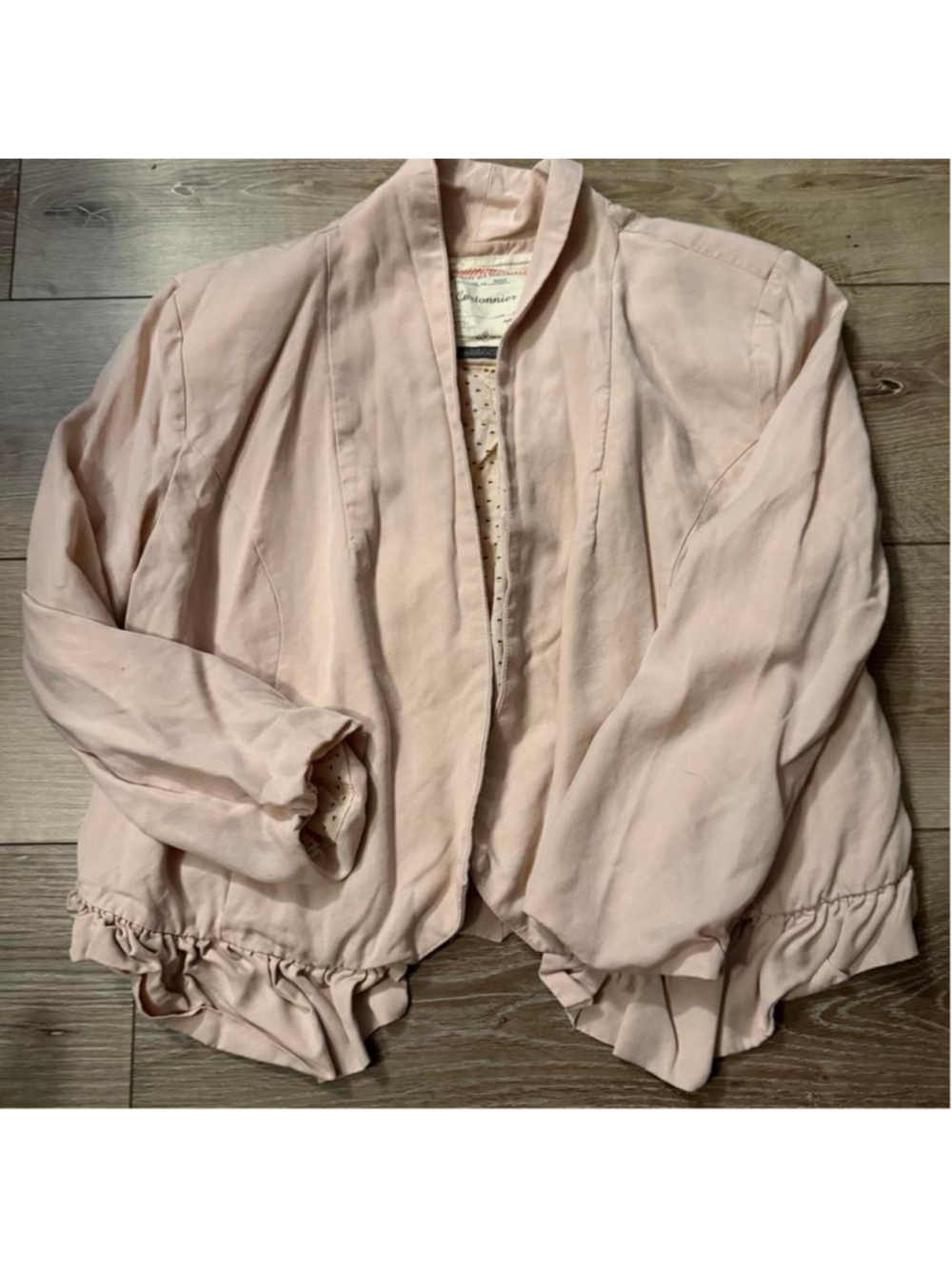 Blush pink ruffle hem open front jacket
Romantic lightweight layering piece